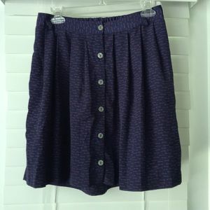 Purple button front patterned pleated skirt